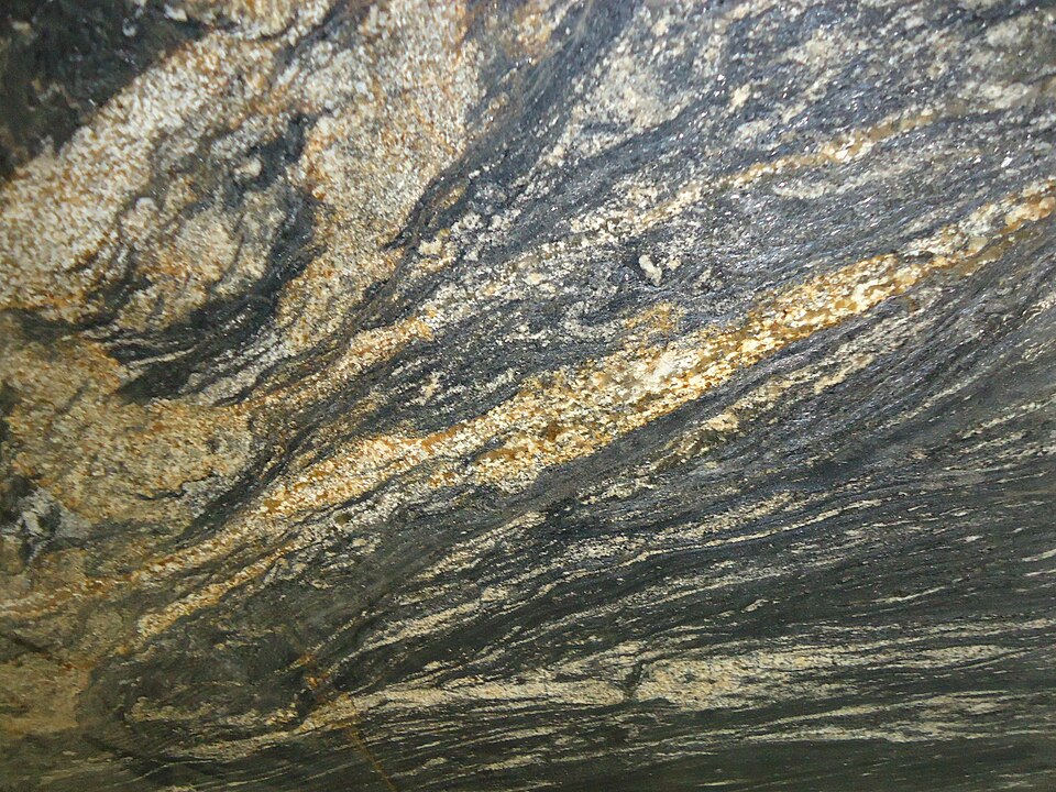 Close view of natural grey granite with irregular veins